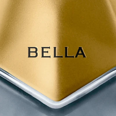 Close-up of gold metallic cap of bottle with Bella engraved on it.